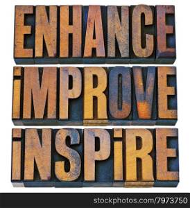 enhance, improve, inspire - a collage of isolated motivational words in vintage letterpress wood type printing blocks