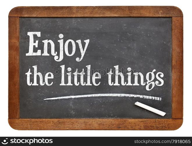 Enjoy little things - inspirational words on a vintage slate blackboard