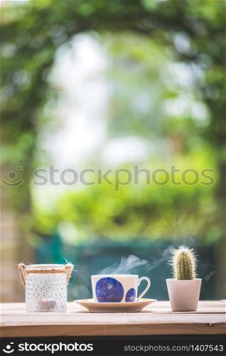 Enjoying a cup of tea in the own garden, copy space