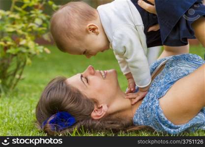 Enjoying life - happy mother with child