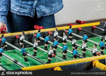 Entertaining games, fun play entertainment concept. Closeup of soccer table football players.. Closeup of soccer table football players