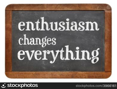 Enthusiasm changes everything - white chalk text on a vintage slate blackboard