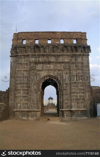 Entrance gate at Raigad fort and Thorne of King Shivaji is seen in background. Maharashtra, India