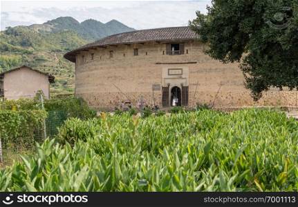 Entrance into the Tulou at Unesco heritage site near Xiamen. Tulou circular communities at Huaan Unesco World Heritage site