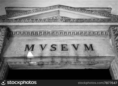 Entrance of an ancient museum, letters on original marble