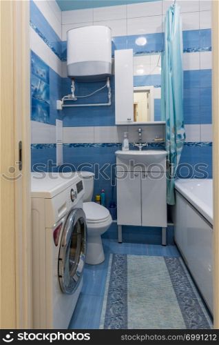 Entrance to a small bathroom with toilet