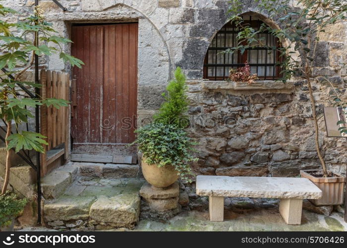 Entrance to the old French house with flowers