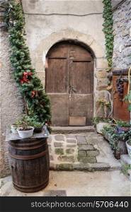 Entrance to the old French house with flowers