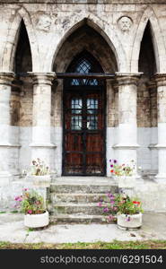 Entrance to the stone church in the Gothic style