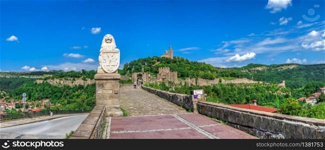 Entrance to the Tsarevets fortress with the Patriarchal Cathedral of the Holy Ascension of God in Veliko Tarnovo, Bulgaria. Big size panoramic view on a sunny summer day. Entrance to the Tsarevets fortress in Veliko Tarnovo, Bulgaria