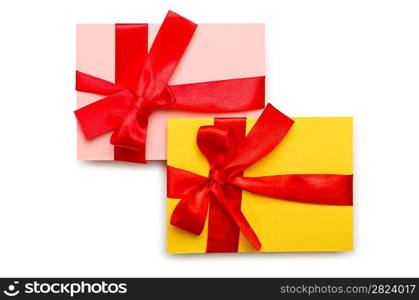 Envelope with colourful ribbon on white