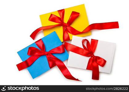 Envelope with colourful ribbon on white