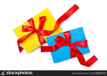 Envelope with colourful ribbon on white