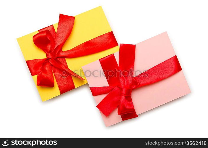 Envelope with colourful ribbon on white