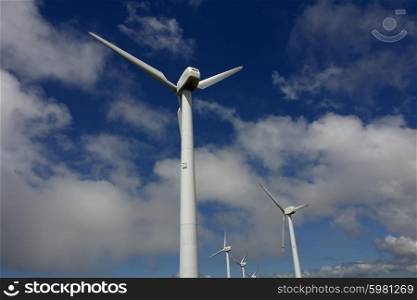 environment electric power windmills and the blue sky