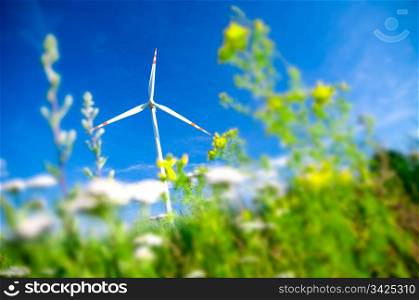Environment fiendly landscape. Wind turbine on the field