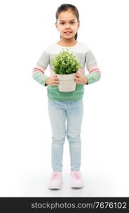environment, nature and people concept - happy smiling girl holding flower in pot over white background. happy smiling girl holding flower in pot