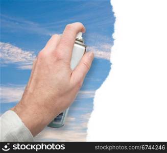 Environmental Concept - Hand Paints Blue Sky With Spray