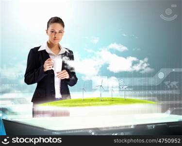 Environmental problems and high-tech innovations. Image of young businesswoman clicking icon on high-tech picture