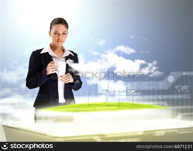 Environmental problems and high-tech innovations. Image of young businesswoman clicking icon on high-tech picture