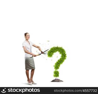Environmental questions. Conceptual image of green plant shaped like question mark