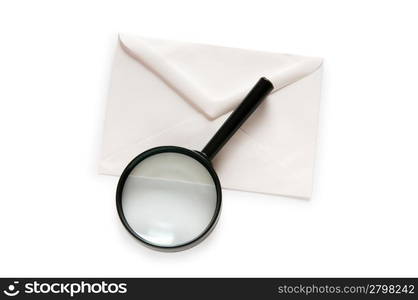 Envlope and magnifying glass isolated on white