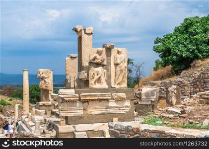 Ephesus, Turkey ? 07.17.2019. The Ruins of The Polyphemus statues of Pollio Fountain in antique Ephesus city, Turkey, on a sunny summer day. Polyphemus statues in the ancient Ephesus, Turkey