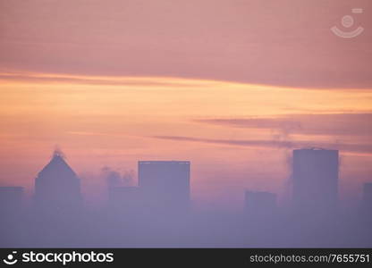 Epic sunrise over London city skyline with stunning sky formations over iconic landmarks