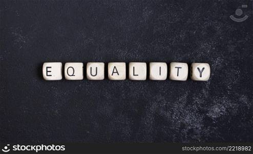equality concept written wooden cubes