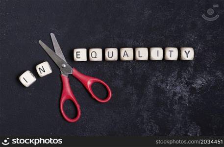 equality inequality concept with scissors