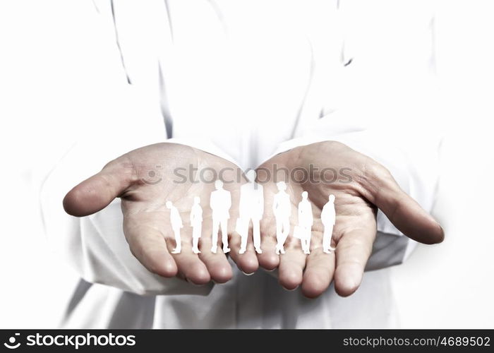 Equality of people. Close up of human hands with row of people figures