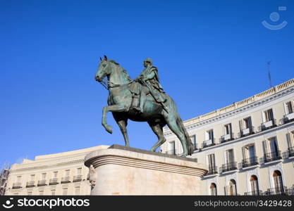 Equestrian statue of King Charles III, historic landmark on Puerta del Sol in Madrid, Spain