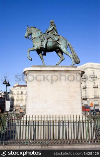 Equestrian statue of King Charles III, historic landmark on Puerta del Sol in Madrid, Spain