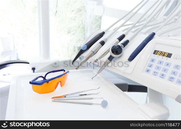 Equipment and dental instruments in dentist’s office. Tools close-up. Dentistry. Equipment and dental instruments in dentist’s office. Dentistry
