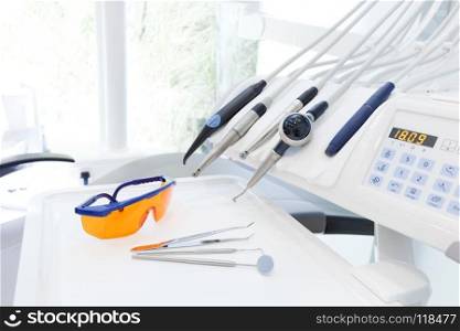 Equipment and dental instruments in dentist’s office. Tools close-up. Dentistry. Equipment and dental instruments in dentist’s office. Dentistry