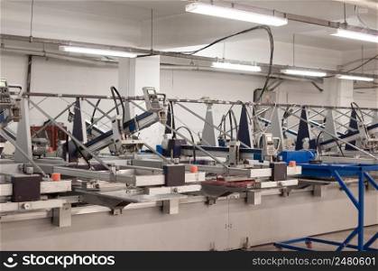 equipment and machines for painting cloth at a garment factory. textile and garment factory