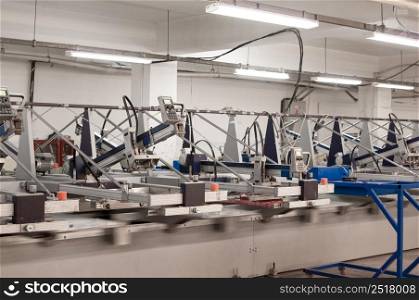 equipment and machines for painting cloth at a garment factory. textile and garment factory