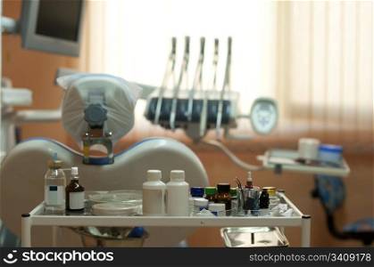 Equipment in the dental office. Chair and lighting. Horizontal image