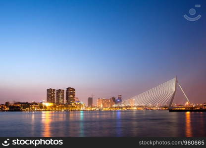 Erasmus Bridge at twilight in the city centre of Rotterdam, Netherlands, South Holland province.