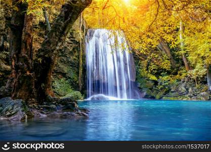 Erawan waterfall in autumn, Thailand. Beautiful waterfall with emerald pool in nature.