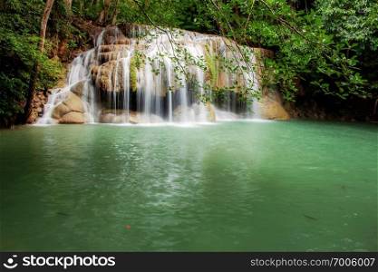 Erawan waterfall in the spring with beautiful of Thailand.