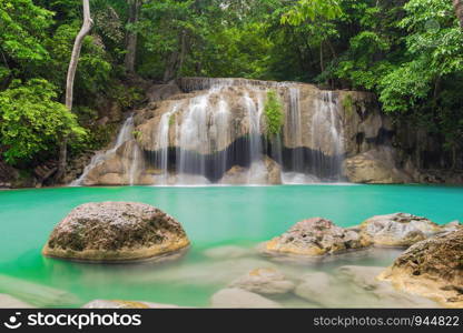 Erawan Waterfall. Nature landscape of Kanchanaburi district in natural area. it is located in Thailand for travel trip on holiday and vacation background, tourist attraction.