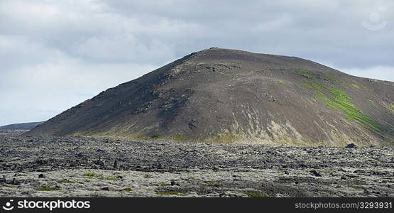 Eroded mountain and rocky volcanic plain