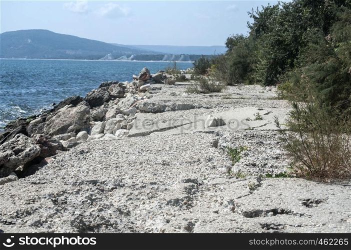 Eroded soil from the sea slope landscape in clear sunny summer day