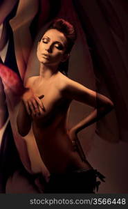 erotic brunette nude woman in dark