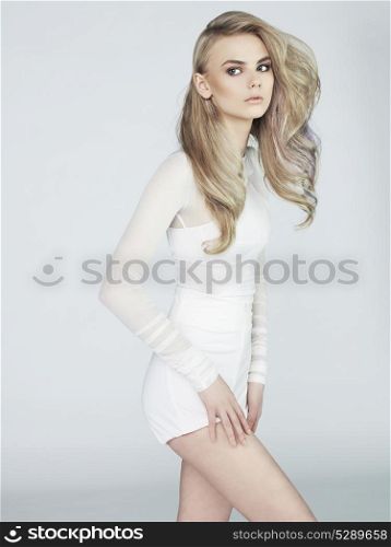Erotic portrait of young beautiful woman. Sexy blonde.