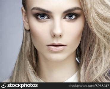 Erotic portrait of young beautiful woman. Sexy blonde.