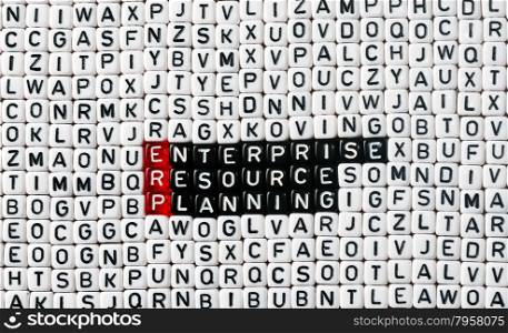 ERP Enterprise Resource Planning writen on black and white dices