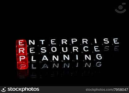 ERP Enterprise Resource Planning writen on black dices
