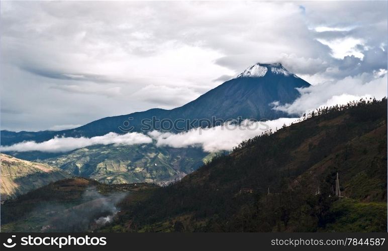 Eruption of a volcano Tungurahua and town Banos de Agua Santa in Ecuador